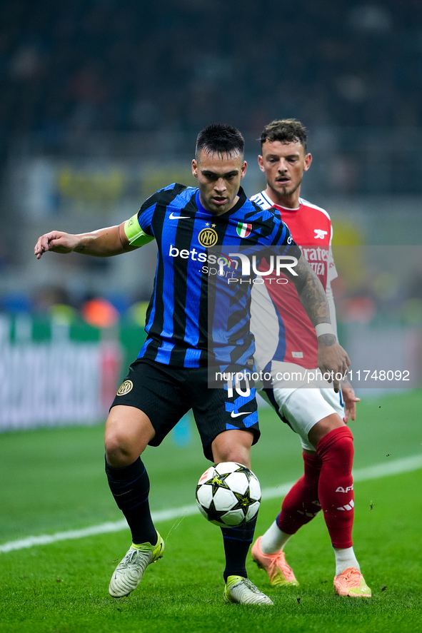 Lautaro Martinez of FC Internazionale and Ben White of Arsenal compete for the ball during the UEFA Champions League 2024/25 League Phase MD...