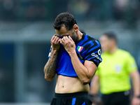 Hakan Calhanoglu of FC Internazionale looks dejected during the UEFA Champions League 2024/25 League Phase MD4 match between FC Internaziona...