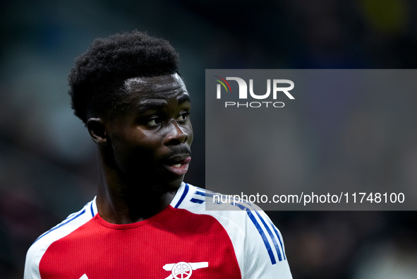 Bukayo Saka of Arsenal looks on during the UEFA Champions League 2024/25 League Phase MD4 match between FC Internazionale and Arsenal at Sta...