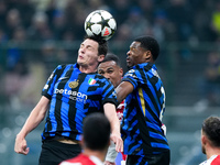 Benjamin Pavard of FC Internazionale and Denzel Dumfries of FC Internazionale jump for the ball during the UEFA Champions League 2024/25 Lea...