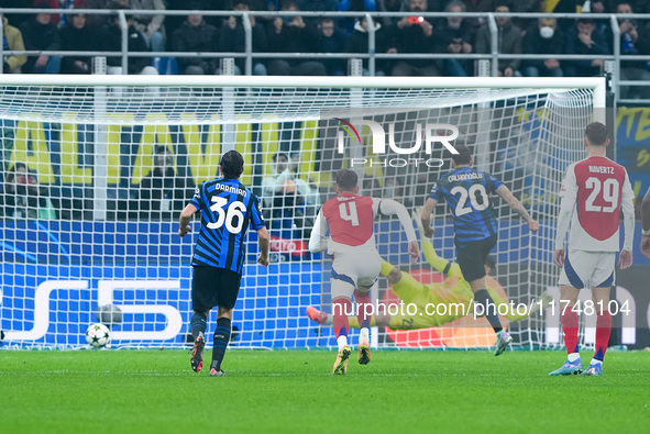 Hakan Calhanoglu of FC Internazionale scores first goal during the UEFA Champions League 2024/25 League Phase MD4 match between FC Internazi...