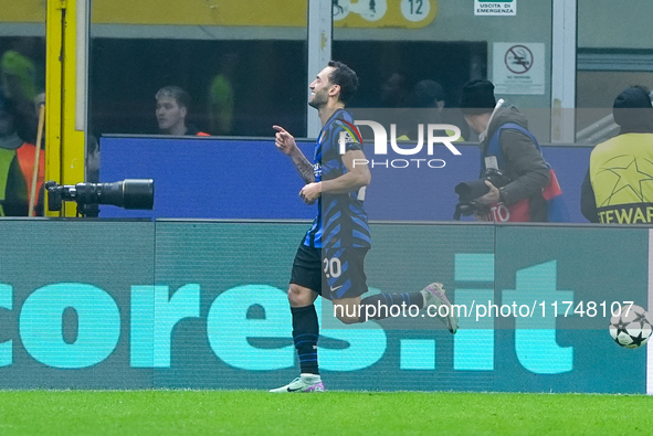 Hakan Calhanoglu of FC Internazionale celebrates after scoring first goal during the UEFA Champions League 2024/25 League Phase MD4 match be...