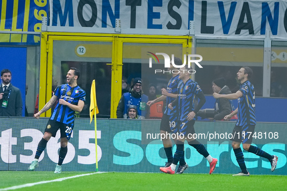 Hakan Calhanoglu of FC Internazionale celebrates after scoring first goal during the UEFA Champions League 2024/25 League Phase MD4 match be...