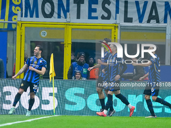 Hakan Calhanoglu of FC Internazionale celebrates after scoring first goal during the UEFA Champions League 2024/25 League Phase MD4 match be...