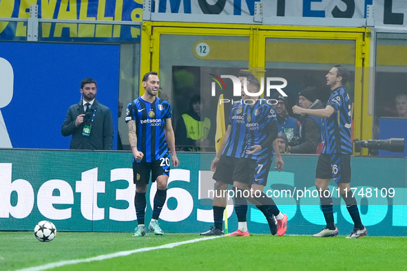 Hakan Calhanoglu of FC Internazionale celebrates after scoring first goal during the UEFA Champions League 2024/25 League Phase MD4 match be...