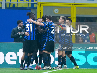 Hakan Calhanoglu of FC Internazionale celebrates after scoring first goal during the UEFA Champions League 2024/25 League Phase MD4 match be...