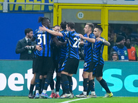 Hakan Calhanoglu of FC Internazionale celebrates after scoring first goal during the UEFA Champions League 2024/25 League Phase MD4 match be...