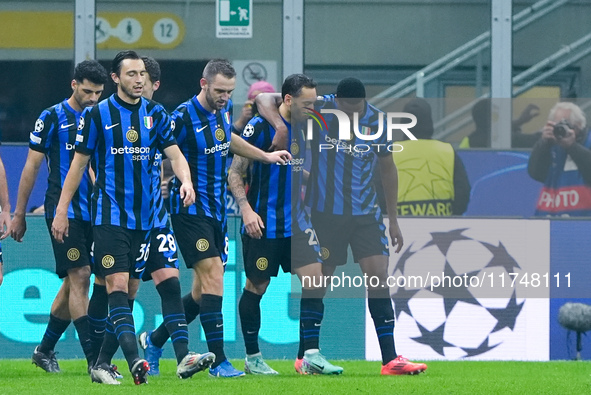 Hakan Calhanoglu of FC Internazionale celebrates after scoring first goal during the UEFA Champions League 2024/25 League Phase MD4 match be...