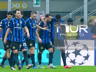 Hakan Calhanoglu of FC Internazionale celebrates after scoring first goal during the UEFA Champions League 2024/25 League Phase MD4 match be...