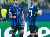 Hakan Calhanoglu of FC Internazionale celebrates after scoring first goal during the UEFA Champions League 2024/25 League Phase MD4 match be...