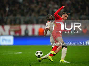 Kerem Aktürkoğlu of Benfica  controls the ball during the Champions League Round 4 match between Bayern Munich v Benfica at the Allianz aren...