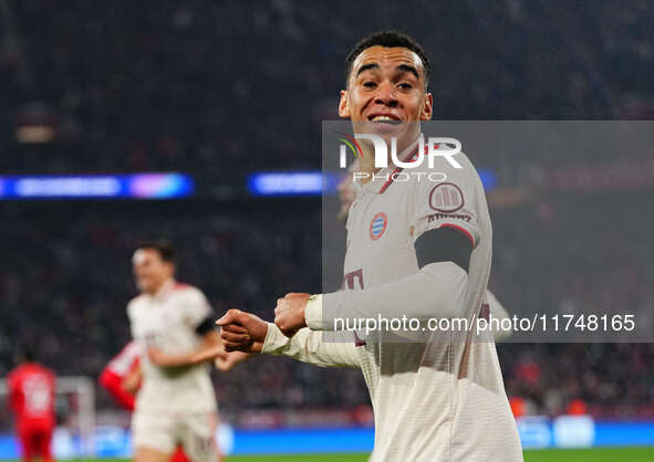 Jamal Musiala of Bayern Munich  celebrates the teams first goal during the Champions League Round 4 match between Bayern Munich v Benfica at...