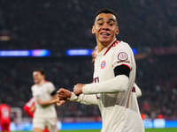 Jamal Musiala of Bayern Munich  celebrates the teams first goal during the Champions League Round 4 match between Bayern Munich v Benfica at...