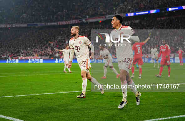 Jamal Musiala of Bayern Munich  celebrates the teams first goal during the Champions League Round 4 match between Bayern Munich v Benfica at...