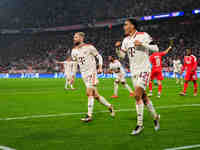 Jamal Musiala of Bayern Munich  celebrates the teams first goal during the Champions League Round 4 match between Bayern Munich v Benfica at...