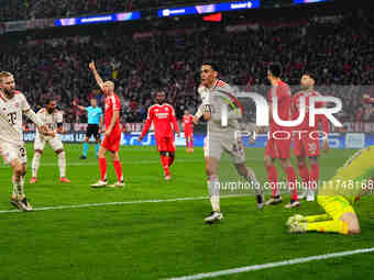 Jamal Musiala of Bayern Munich  celebrates the teams first goal during the Champions League Round 4 match between Bayern Munich v Benfica at...