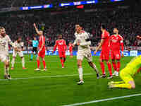 Jamal Musiala of Bayern Munich  celebrates the teams first goal during the Champions League Round 4 match between Bayern Munich v Benfica at...