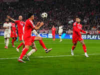 Jamal Musiala of Bayern Munich  scores the teams first goal during the Champions League Round 4 match between Bayern Munich v Benfica at the...