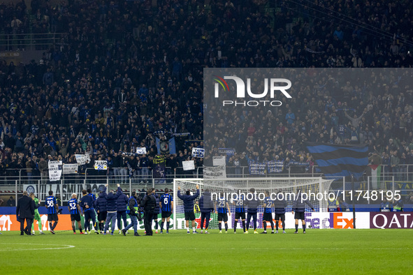 The FC Internazionale team celebrates with the fans after the victory during the UEFA Champions League 2024/25 match between FC Internaziona...