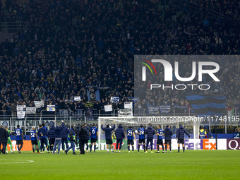 The FC Internazionale team celebrates with the fans after the victory during the UEFA Champions League 2024/25 match between FC Internaziona...