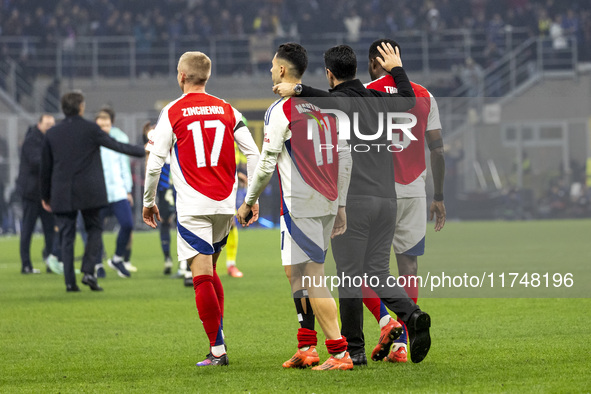 Oleksandr Zinchenko, Gabriel Martinelli, Mikel Arteta, and Thomas Partey play during the UEFA Champions League 2024/25 match between FC Inte...