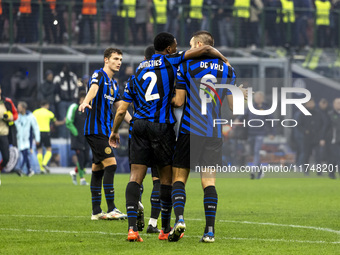 Denzel Dumfries and Stefan De Vrij play during the UEFA Champions League 2024/25 match between FC Internazionale and FC Arsenal in Milano, I...