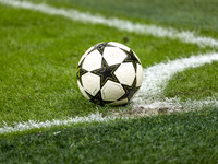 The official Champions League ball is on the pitch during the UEFA Champions League 2024/25 match between FC Internazionale and FC Arsenal i...