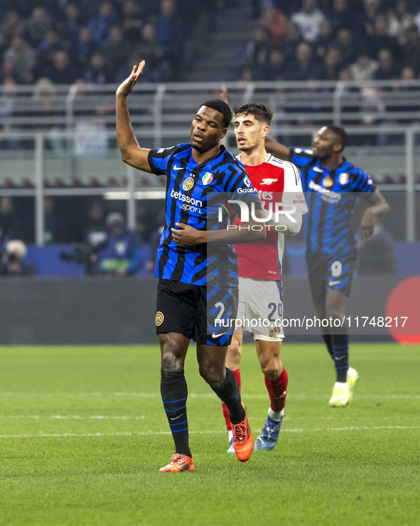 Denzel Dumfries plays during the UEFA Champions League 2024/25 match between FC Internazionale and FC Arsenal at Stadio Giuseppe Meazza in M...