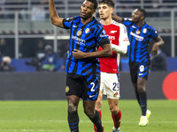 Denzel Dumfries plays during the UEFA Champions League 2024/25 match between FC Internazionale and FC Arsenal at Stadio Giuseppe Meazza in M...