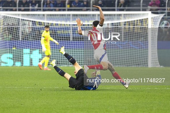 Gabriel Jesus and Nicolo Barella are in action during the UEFA Champions League 2024/25 match between FC Internazionale and FC Arsenal in Mi...