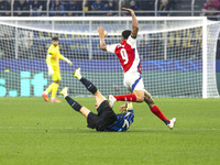 Gabriel Jesus and Nicolo Barella are in action during the UEFA Champions League 2024/25 match between FC Internazionale and FC Arsenal in Mi...