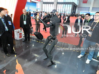 The world's first full-size humanoid robot ''Tiangong'', which can run like a human, performs at the China Pavilion of the 7th China Interna...