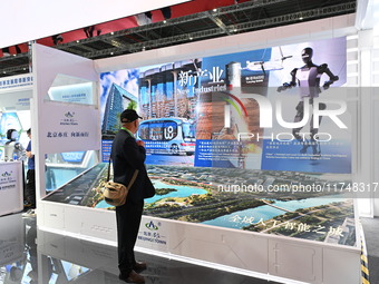 Visitors visit the China Pavilion at the 7th China International Import Expo in Shanghai, China, on November 6, 2024. (