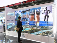 Visitors visit the China Pavilion at the 7th China International Import Expo in Shanghai, China, on November 6, 2024. (