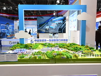 A model of the China-Vietnam Friendship Pass - Friendship Smart Port project is displayed at the 7th China International Import Expo in Shan...