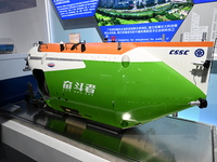 A model of the 1:6 ''Fighter'' all-sea deep-sea manned submersible is displayed at the China Pavilion at the 7th China International Import...