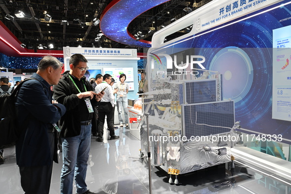 A 1:2 model of the Chang'e-6 probe is displayed at the China Pavilion at the 7th China International Import Expo in Shanghai, China, on Nove...