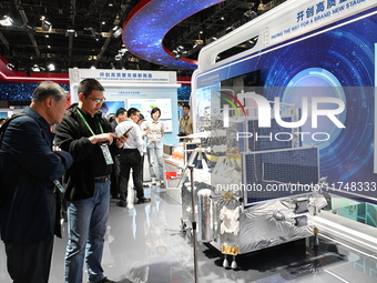 A 1:2 model of the Chang'e-6 probe is displayed at the China Pavilion at the 7th China International Import Expo in Shanghai, China, on Nove...