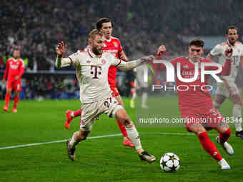 Konrad Laimer of Bayern Munich  controls the ball during the Champions League Round 4 match between Bayern Munich v Benfica at the Allianz a...