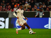 Kingsley Coman of Bayern Munich  controls the ball during the Champions League Round 4 match between Bayern Munich v Benfica at the Allianz...