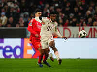 Kingsley Coman of Bayern Munich  controls the ball during the Champions League Round 4 match between Bayern Munich v Benfica at the Allianz...