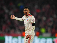 Jamal Musiala of Bayern Munich  gestures during the Champions League Round 4 match between Bayern Munich v Benfica at the Allianz arena, Mun...