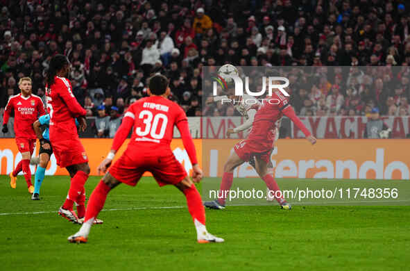 Kingsley Coman of Bayern Munich  shoots on goal during the Champions League Round 4 match between Bayern Munich v Benfica at the Allianz are...