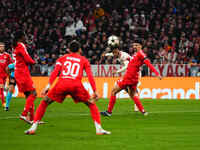 Kingsley Coman of Bayern Munich  shoots on goal during the Champions League Round 4 match between Bayern Munich v Benfica at the Allianz are...