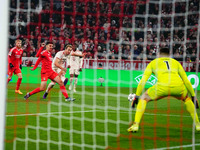 Harry Kane of Bayern Munich  shoots on goal during the Champions League Round 4 match between Bayern Munich v Benfica at the Allianz arena,...