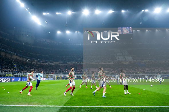 Players of Arsenal durign the warm-up prior the UEFA Champions League 2024/25 League Phase MD4 match between FC Internazionale and Arsenal a...