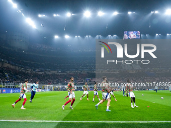 Players of Arsenal durign the warm-up prior the UEFA Champions League 2024/25 League Phase MD4 match between FC Internazionale and Arsenal a...