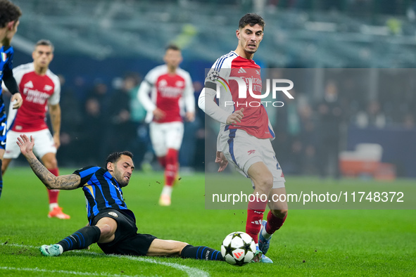 Kai Havertz of Arsenal and Hakan Calhanoglu of FC Internazionale compete for the ball during the UEFA Champions League 2024/25 League Phase...