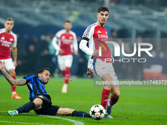 Kai Havertz of Arsenal and Hakan Calhanoglu of FC Internazionale compete for the ball during the UEFA Champions League 2024/25 League Phase...