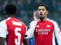 William Saliba of Arsenal yells during the UEFA Champions League 2024/25 League Phase MD4 match between FC Internazionale and Arsenal at Sta...